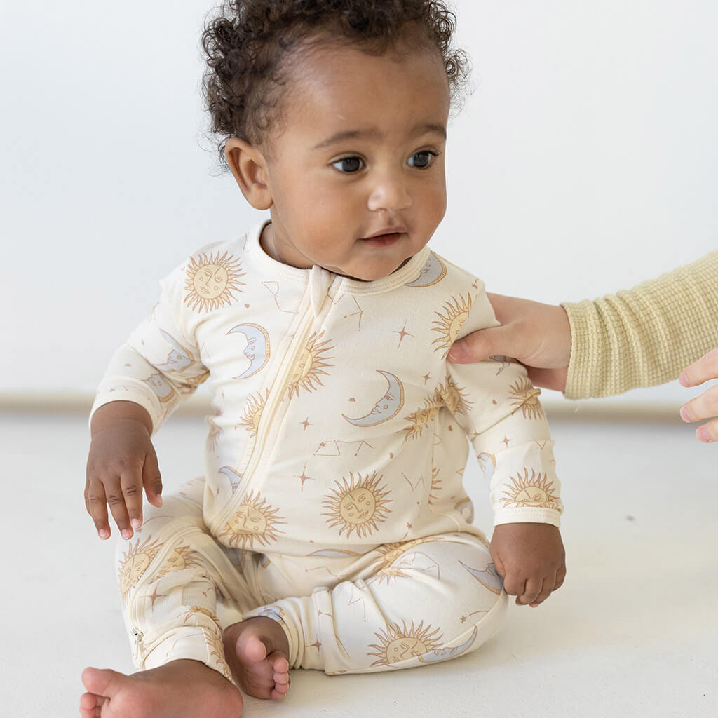 baby sun and moon printed bamboo jumpsuit