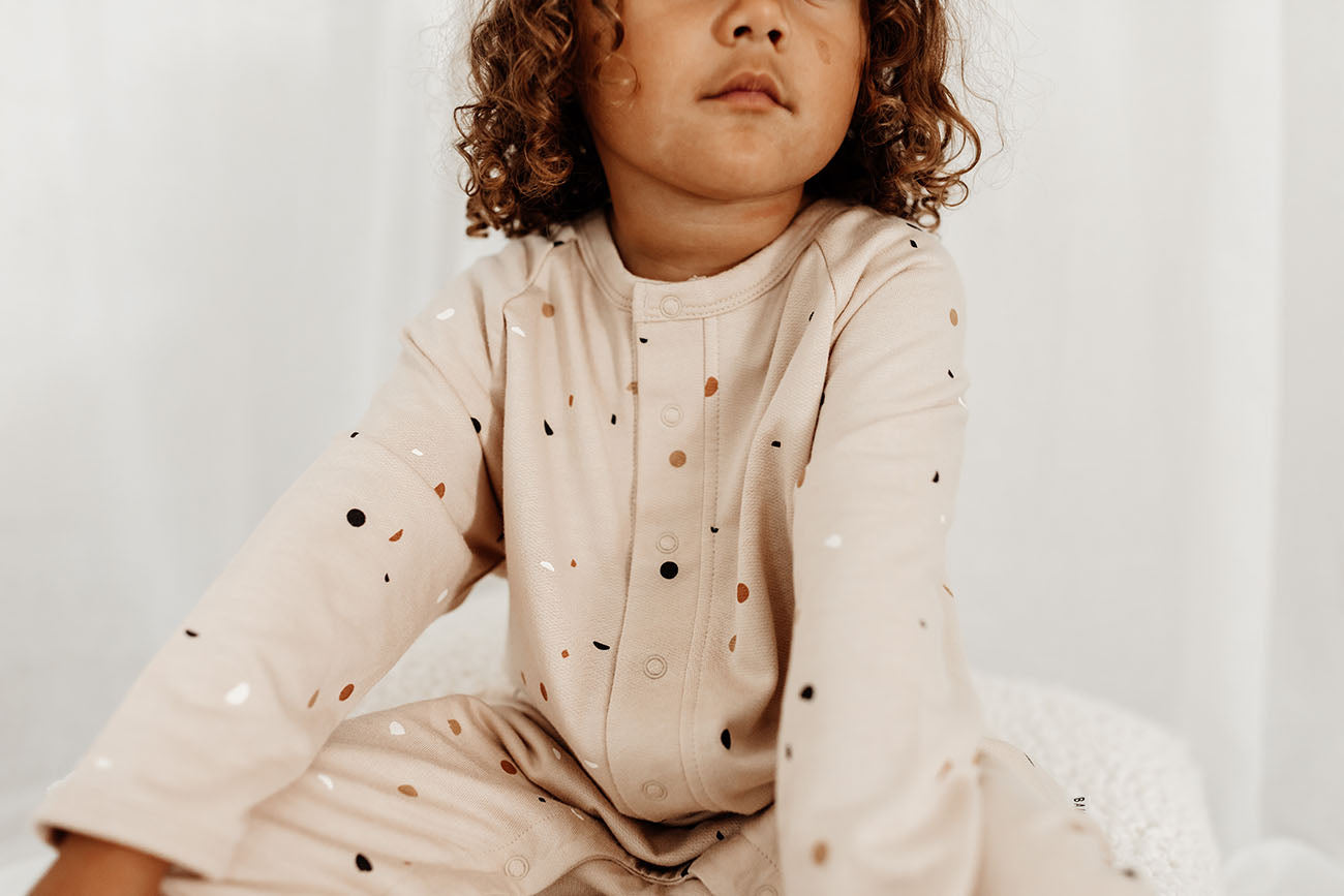 Terrazzo printed baby fleece beige jumpsuit  by Bam Loves Boo