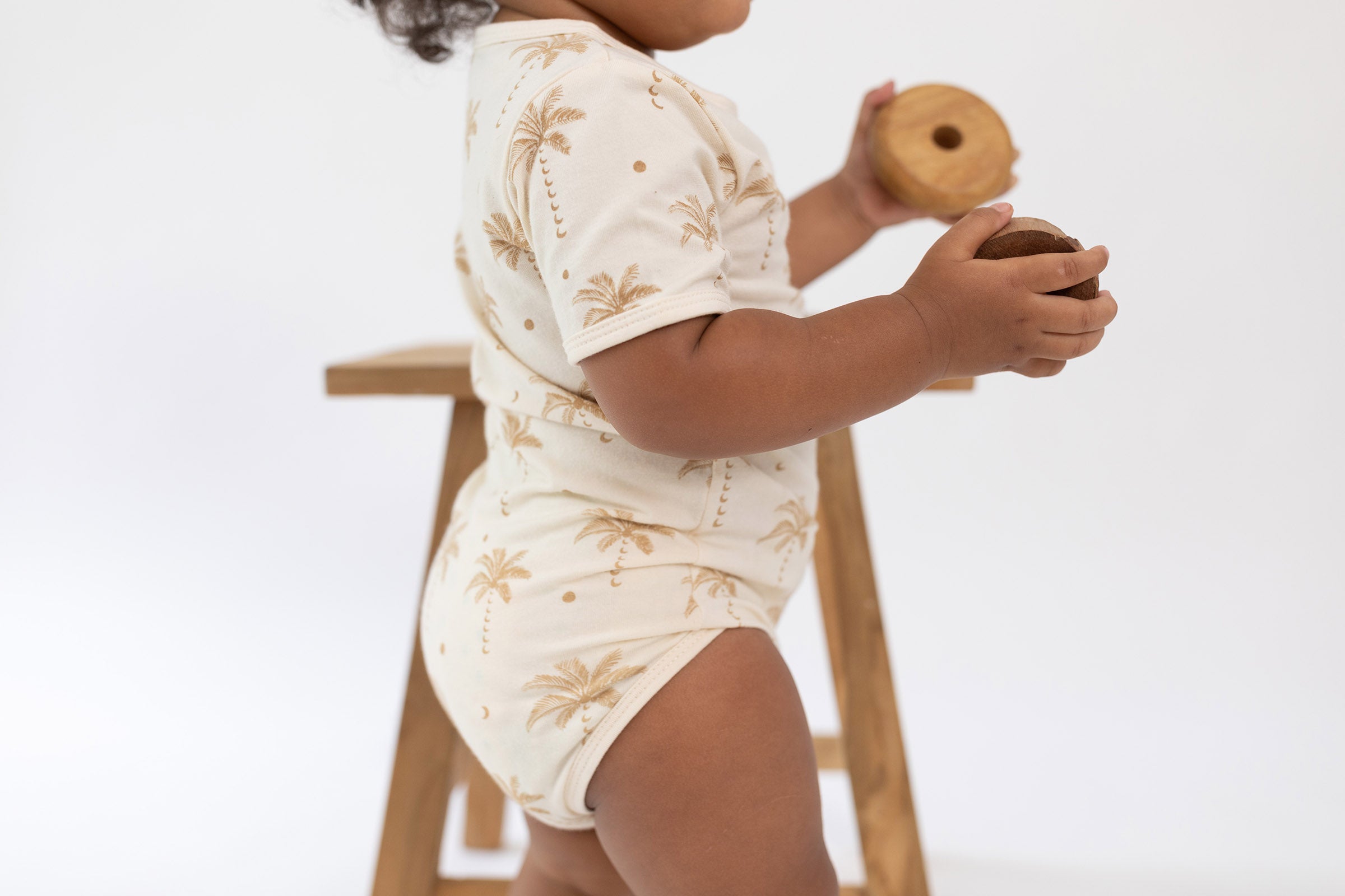 Oasis Palm Tree cream baby onesie by Bam Loves Boo