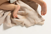 Baby toes in Organic Cotton blanket with Palm tree jacquard by Bam Loves Boo