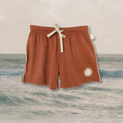 rust-kids-bamboo-shorts-with-sun-print-leg