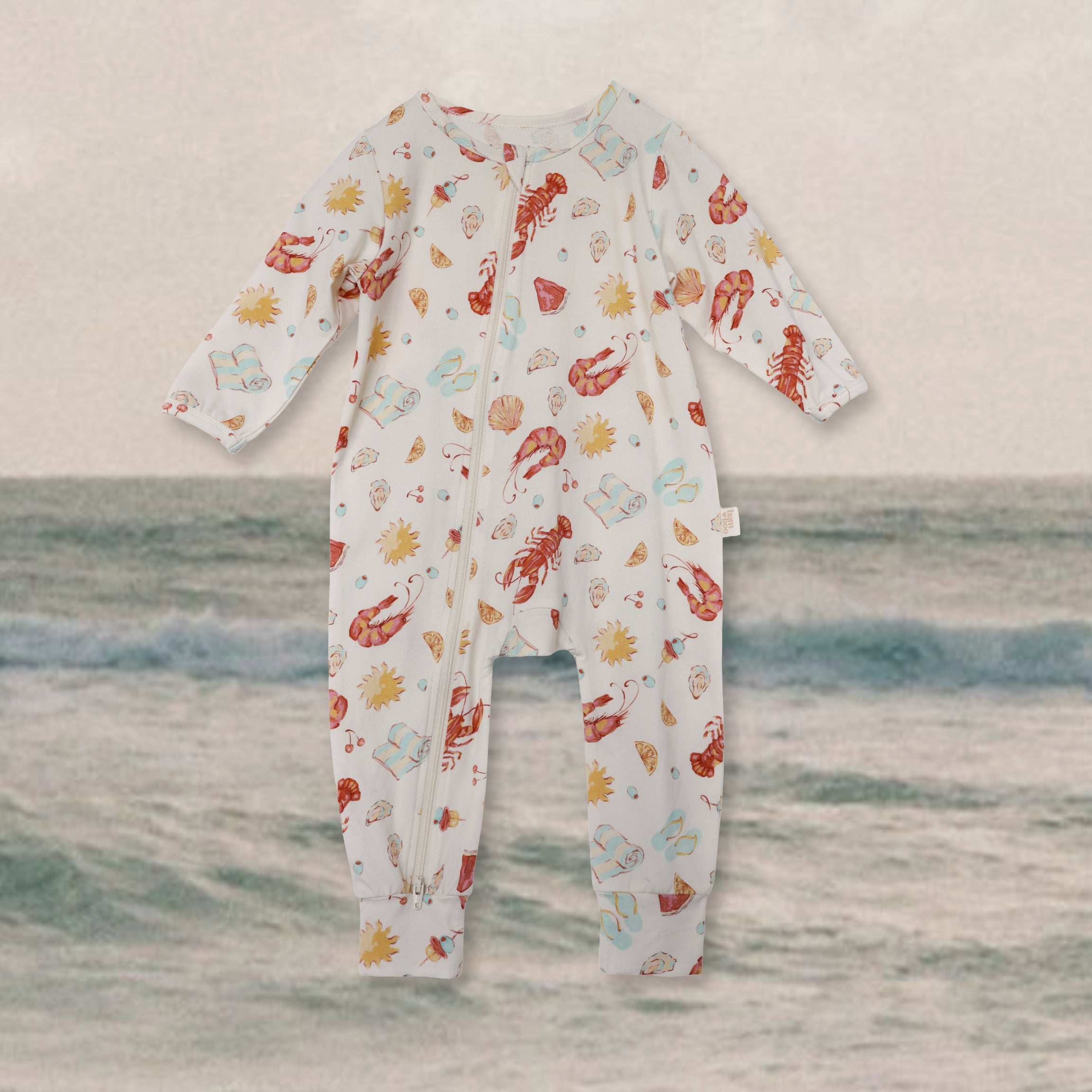 Baby zip-front romper – Aussie Christmas’print on cream; long sleeves