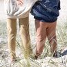 kids on the beach with backs to camera in bamboo leggings