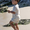 Cream Tee and shorts with palm tree pattern