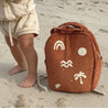 Kids Red rust Corduroy backpack on beach