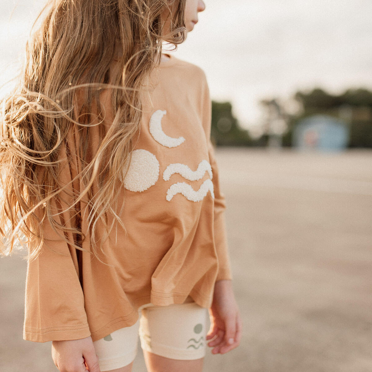 embroidered sun moon and waves on bamboo long sleeve tee
