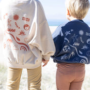 back shot of kids in back printed jumpers