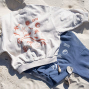 Kids navy and cream  jumper with back print and beach icons organic cotton