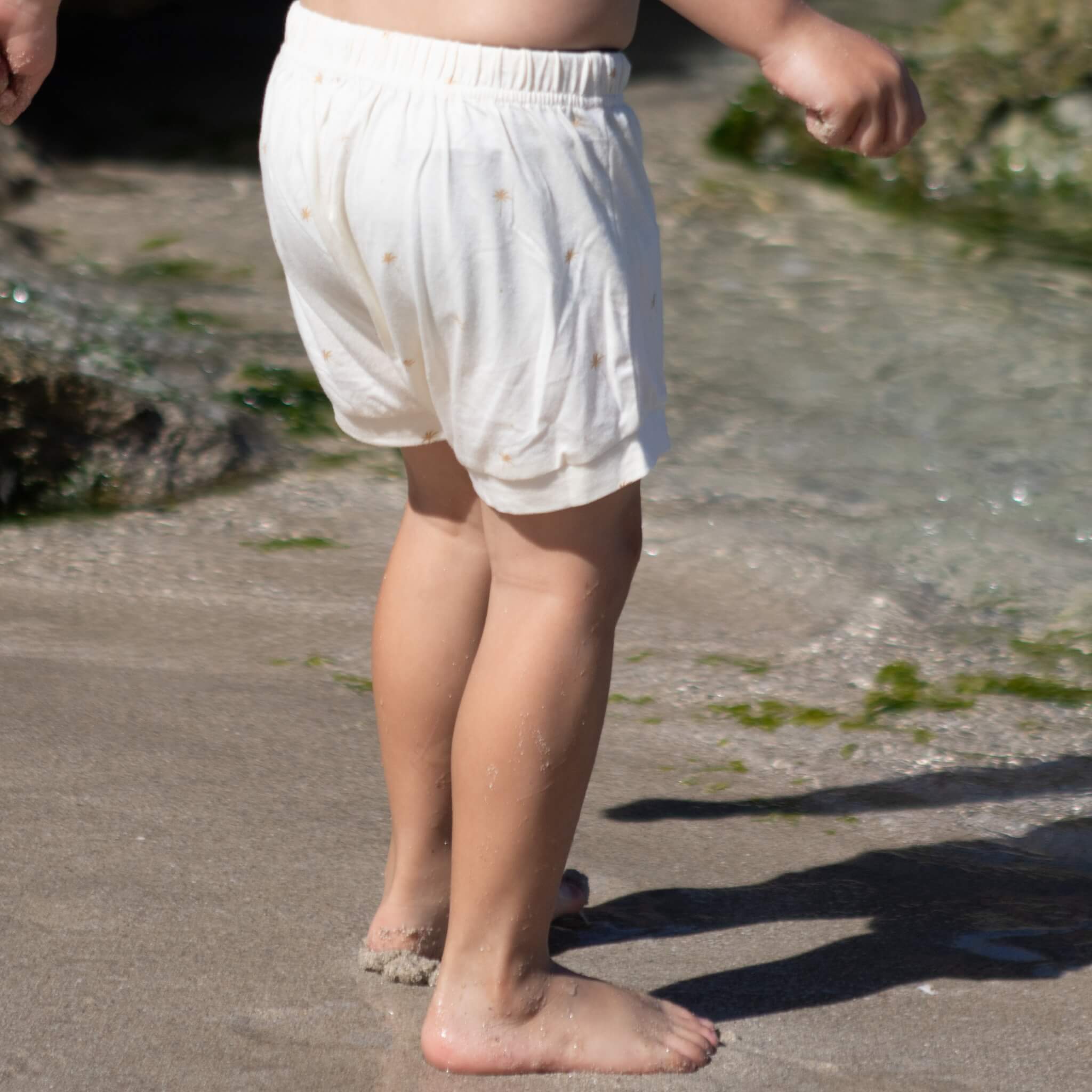 cream bamboo shorts with mini p[alm tree print
