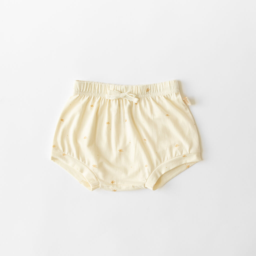 Cream bamboo shorts with palm tree pattern