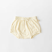 Cream bamboo shorts with palm tree pattern