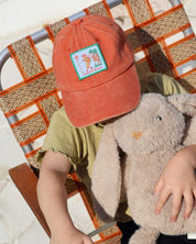 retro 90s kids red cap with scout badge