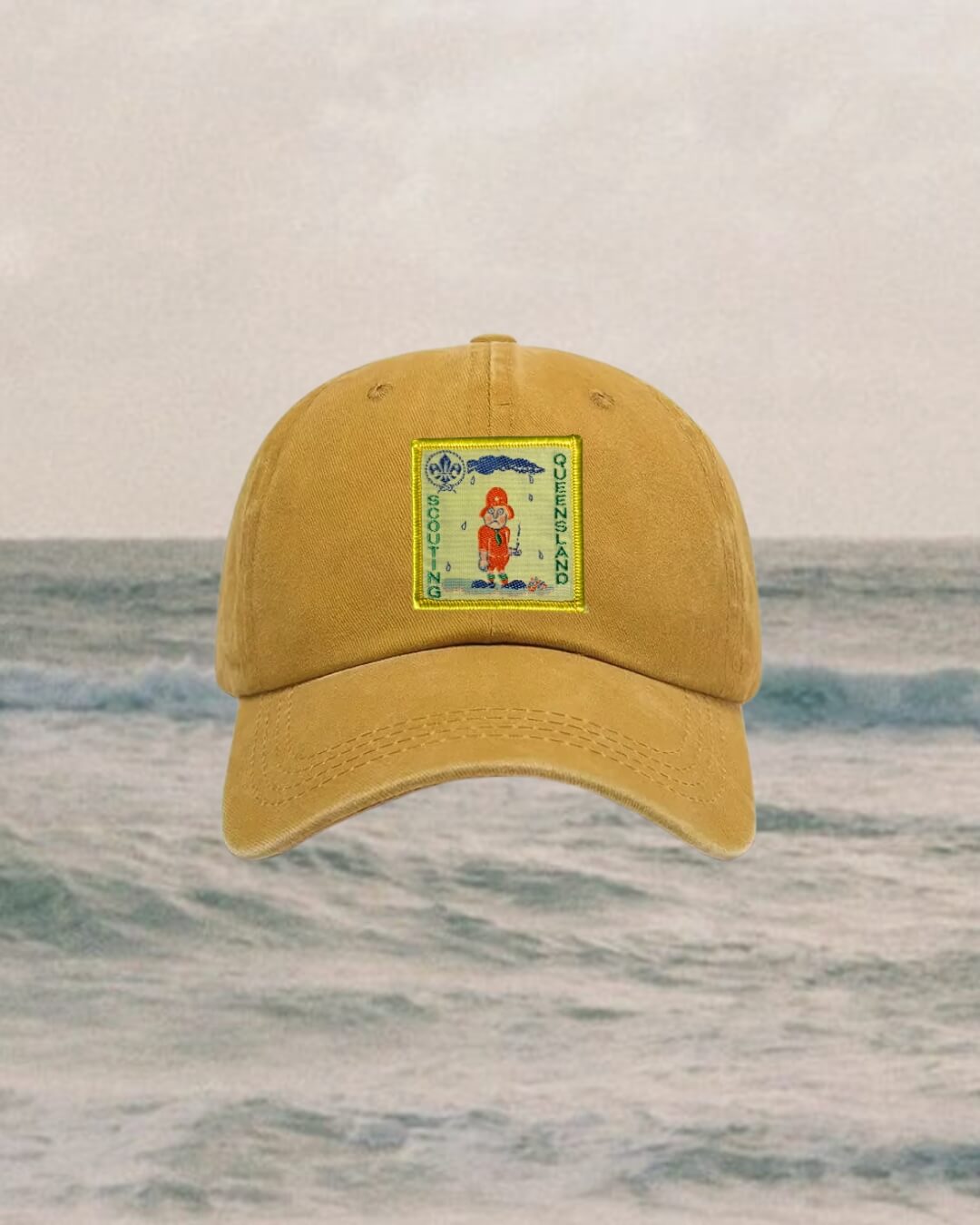 mustard Yellow cap with a scout logo patch
