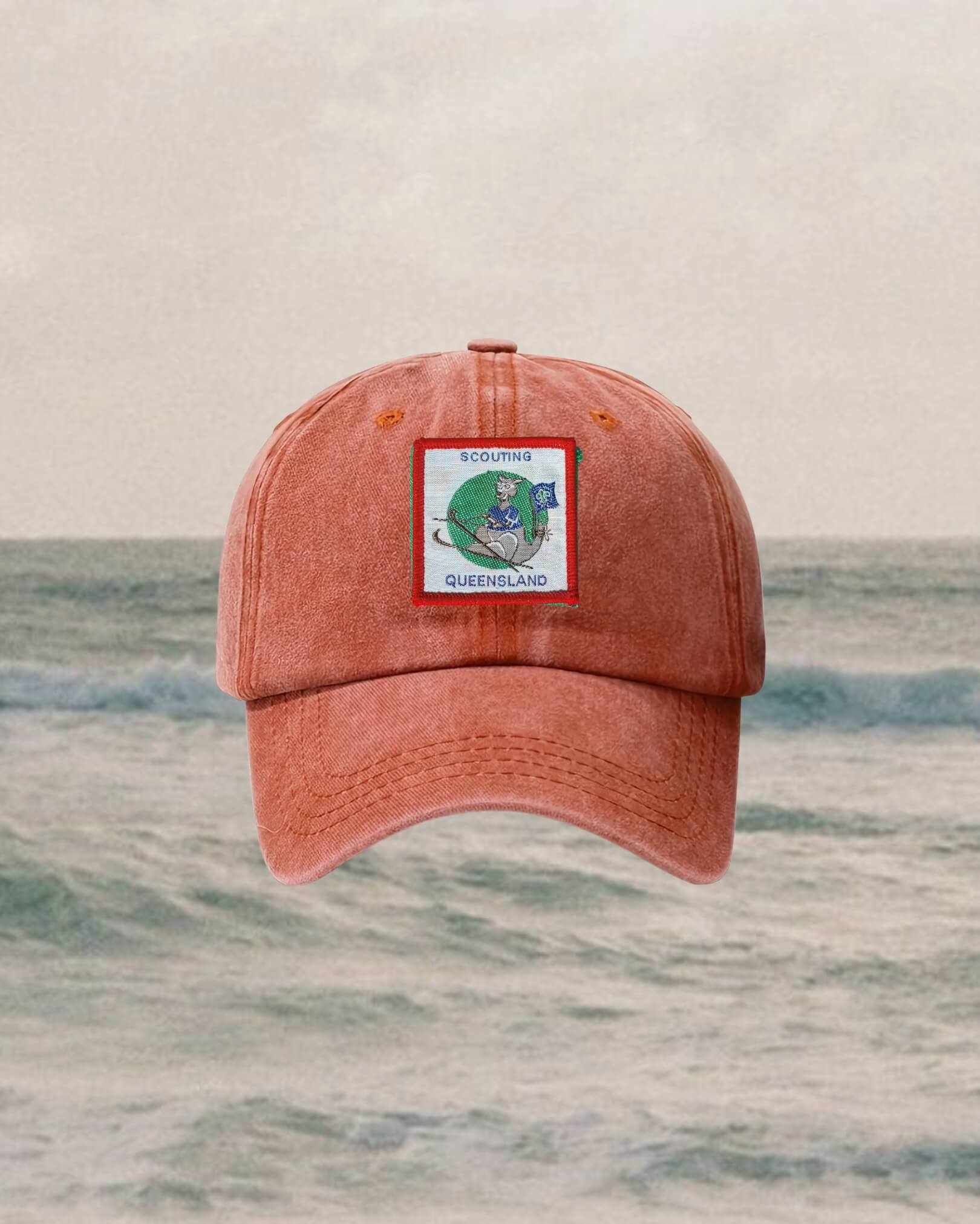 retro 90s kids red cap with scout badge roo