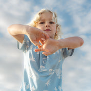 Close up of the blue Kailani shell print on a pyjama tee by Bam Loves Boo