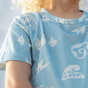 Close up of the blue Kailani shell print on a pyjama tee shoulder by Bam Loves Boo