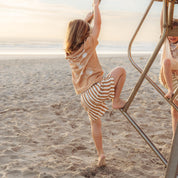 Tan and cream striped shorts with tied drawstring waist by Bam Loves Boo