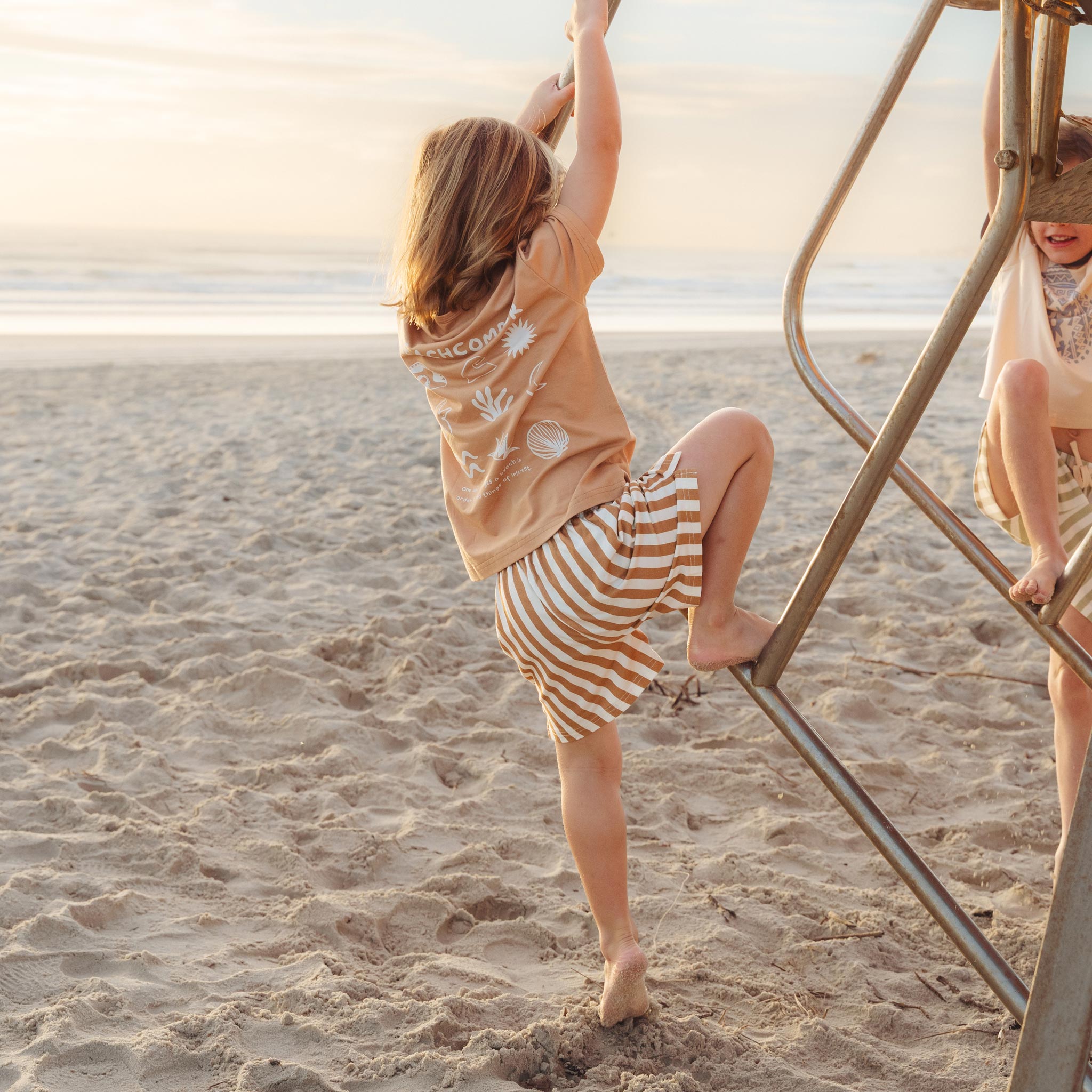 Tan and cream striped shorts with tied drawstring waist by Bam Loves Boo