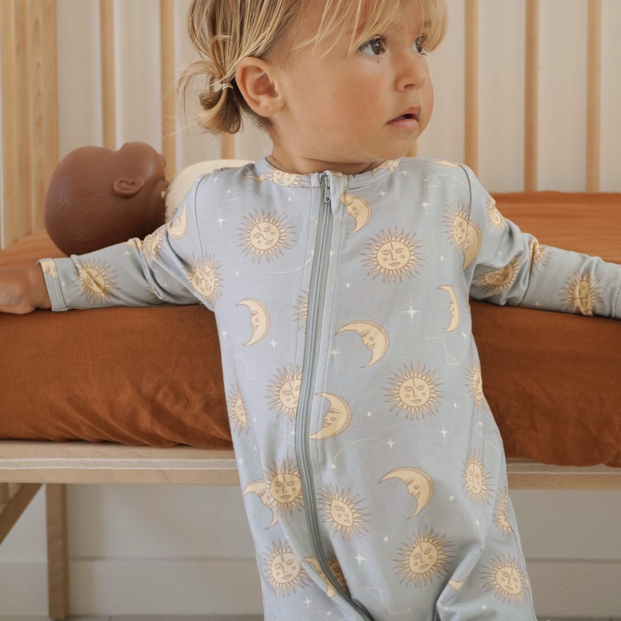blue_yellow_celestial_sun_moon_zippy_baby_bamboo_jumpsuit.jpg