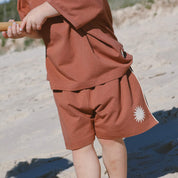 rust-short-withsun-print-on-beach