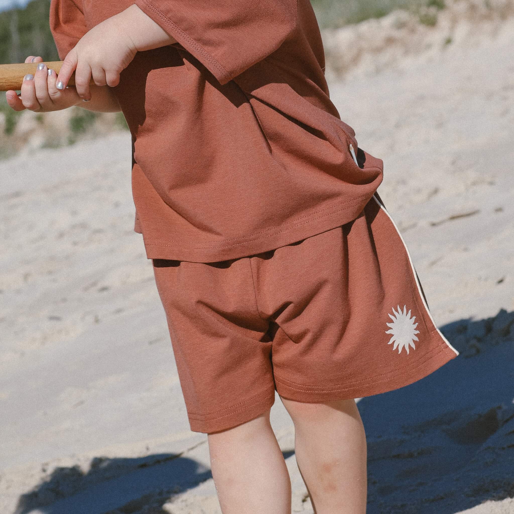 rust-short-withsun-print-on-beach