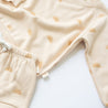 close up sun printed beige bamboo jumper and kids shorts
