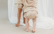 Terrazzo printed baby fleece Bumbums in beige by Bam Loves Boo