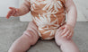 baby wearing bamboo cotton onesie