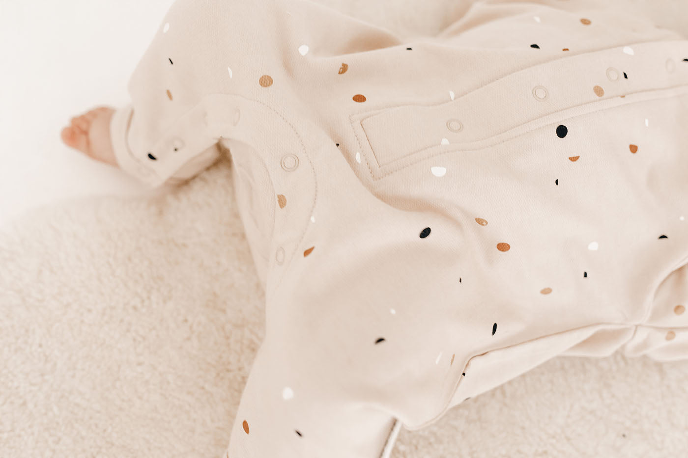Terrazzo printed baby fleece beige jumpsuit by Bam Loves Boo