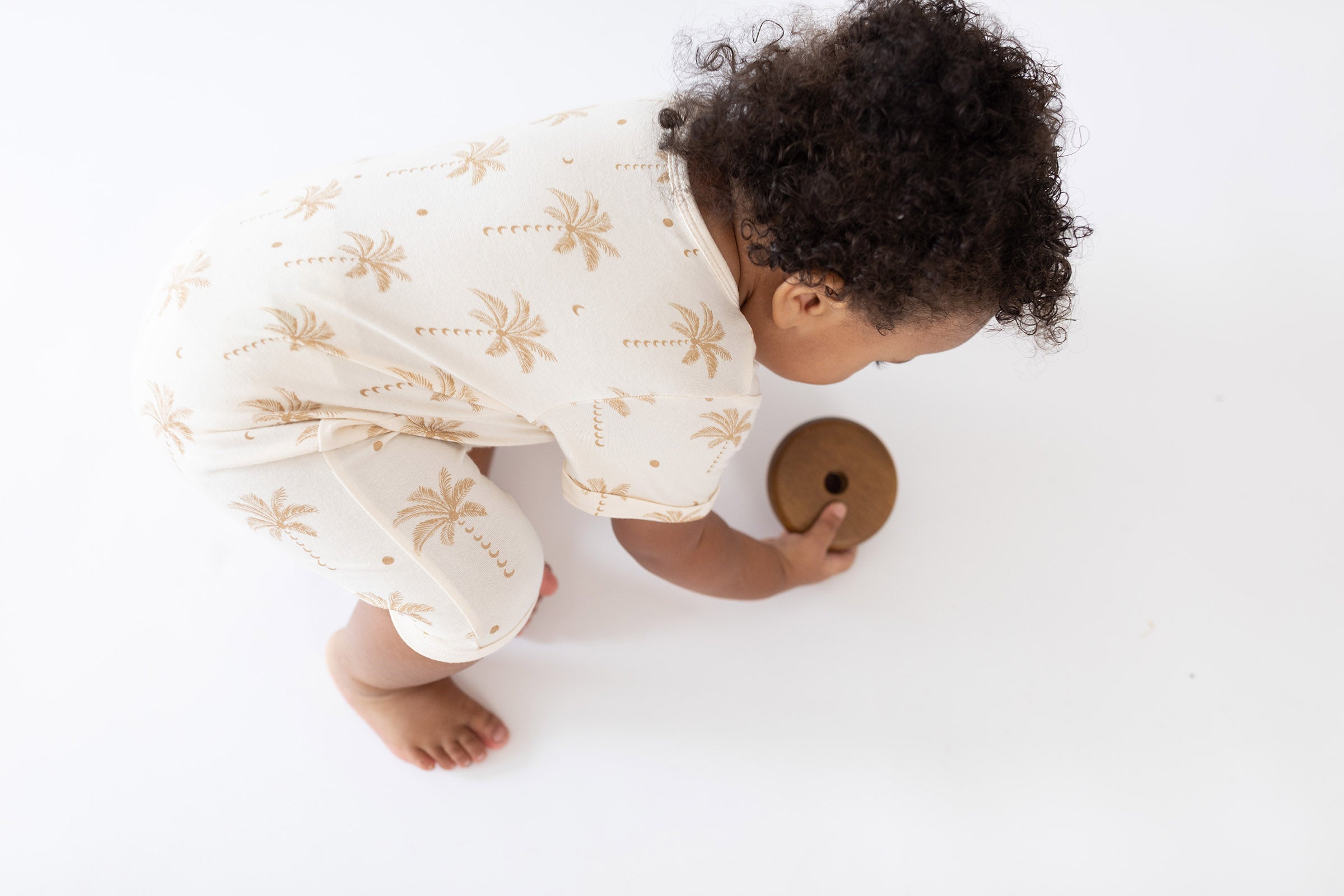 Oasis Moon palm Tree cream jumpsuit by Bam Loves Boo