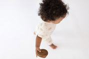 Oasis Moon palm Tree cream jumpsuit by Bam Loves Boo