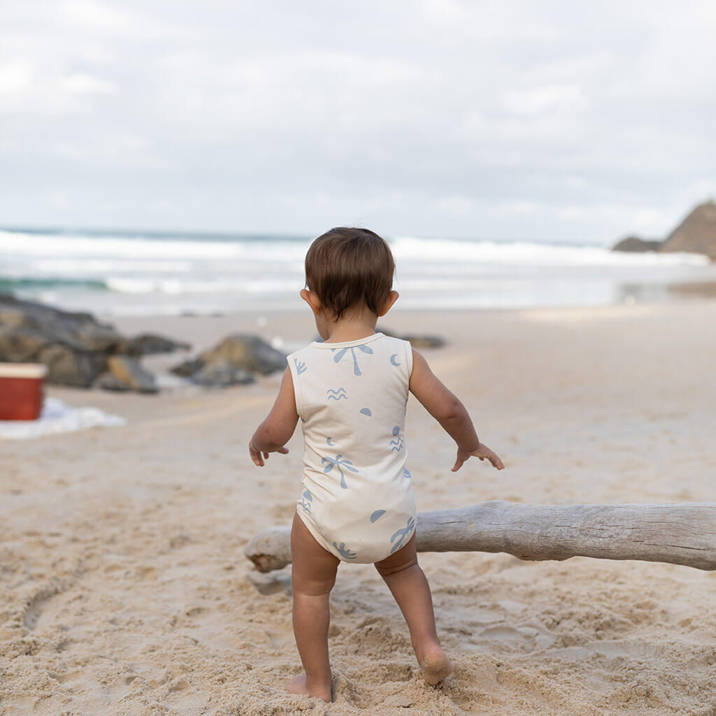 Cali baby bamboo onesie on beach by bam Loves Boo
