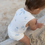 baby wearing cali baby cream onesie