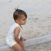 cali printed bamboo cream and blue baby onesie