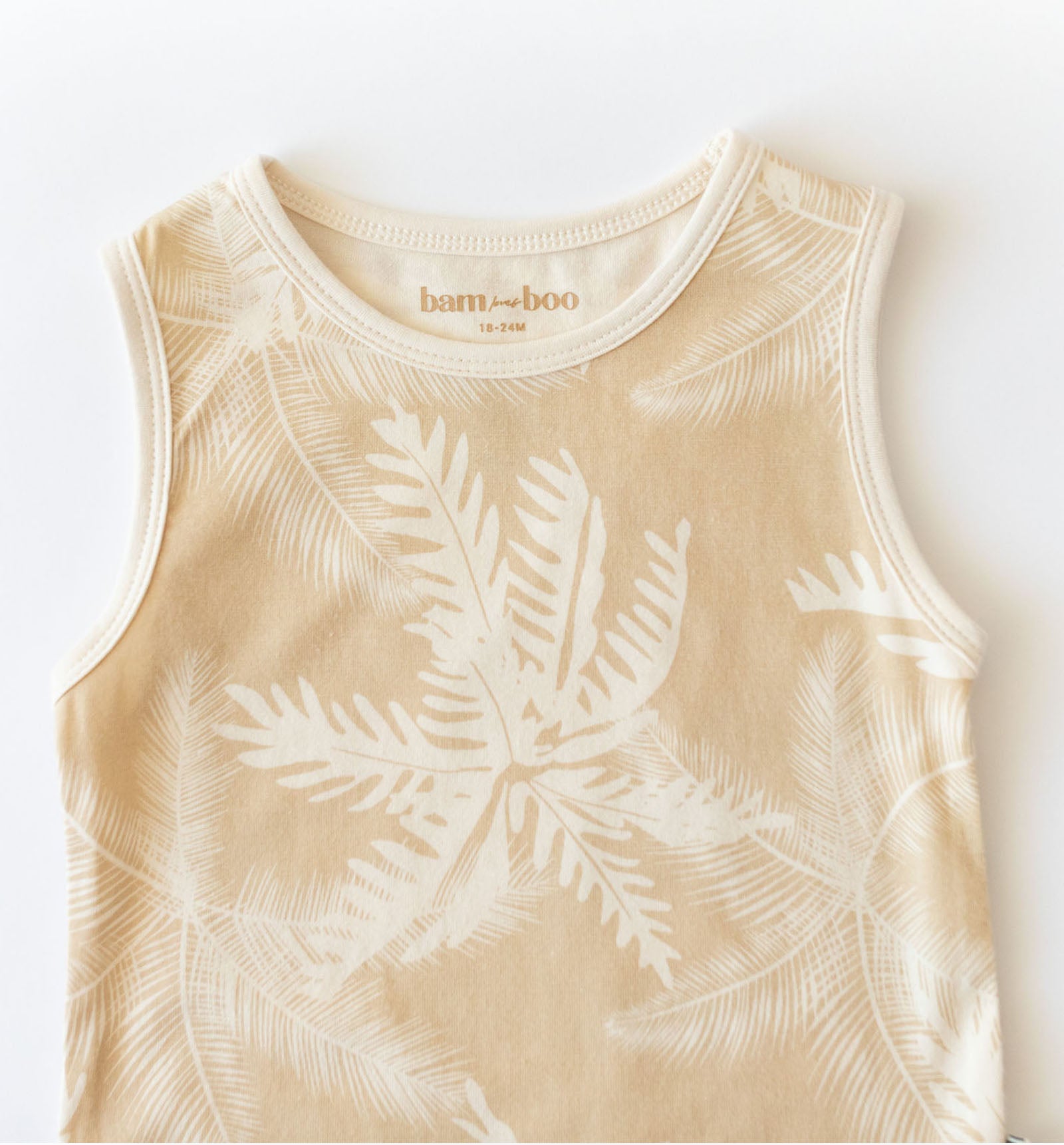 Palm printed beige and cream baby onesie by Bam Loves Boo