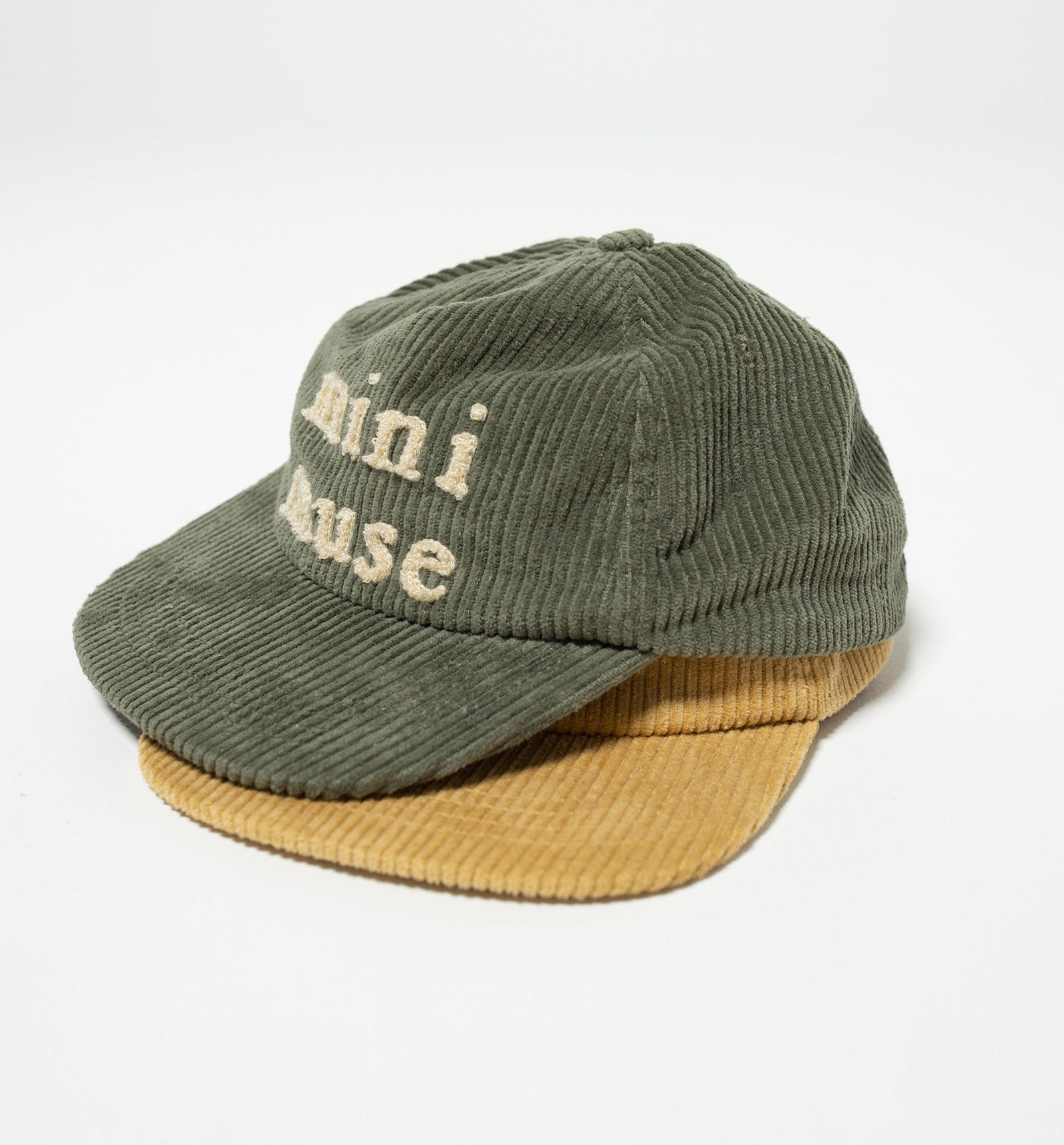 Green kids cap with mini muse embroidery