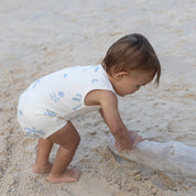 Cream and blue baby onesie with cali print.